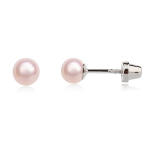 May include: A pair of pearl stud earrings with a silver post and butterfly back.
