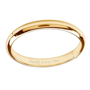 14K gold plated bangle bracelet with Daddy Loves You! engraved on the inside.