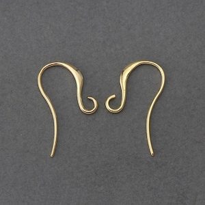 May include: A pair of gold-toned earring hooks. The hooks are made of metal and have a simple, elegant design.