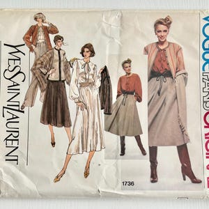 May include: Vintage Vogue Paris Original sewing pattern featuring Yves Saint Laurent designs. The pattern envelope displays illustrations of women's fashion, including skirts, jackets, and dresses. The color palette includes browns, creams, and rusts. The pattern number is 1736.
