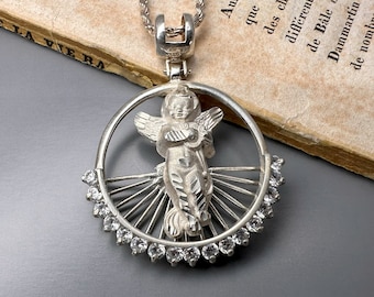 Vintage 925 zilveren beschermengelhanger aan een ketting