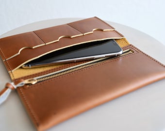 Cartera de cuero para teléfono con bolsillo para teléfono y bolsillo con cremallera