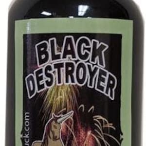 May include: A 1 ounce (29.5 ml) bottle of Black Destroyer oil, also known as Negro Destructor. The bottle has a black label with a white unicorn and fireworks graphic. The label also includes the text "2goodluck.com" and "Oil Aceite".