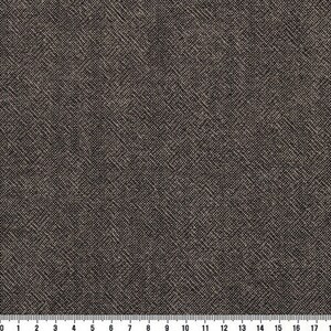 May include: Close-up of a textured fabric with a dark brown and beige woven pattern. The fabric has a diagonal weave, creating a subtle grid-like appearance. The image shows a section of the fabric with a ruler along the bottom edge.