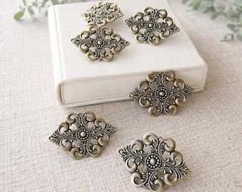 Chinchetas de corcho con adornos dorados y elegantes para tableros de mensajes