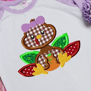 Turkey girl holding pumpkin applique machine embroidery design