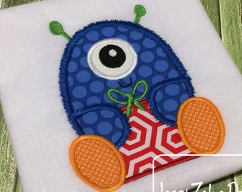 Monster with gift or present appliqué embroidery design - monster appliqué design - Christmas appliqué design - gift appliqué design