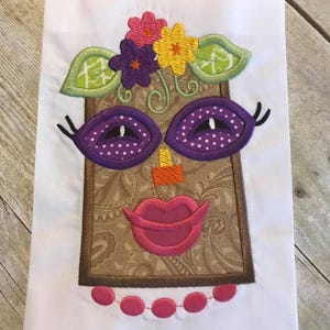 Girl Tiki mask appliqué machine embroidery design
