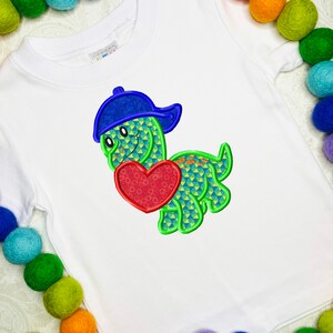 Dinosaur with heart appliqué machine embroidery design