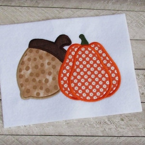 Diseño de bordado a máquina con apliques de bellota y calabaza