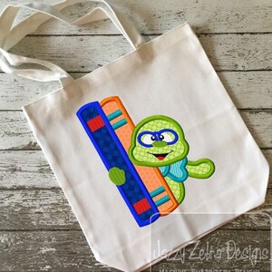 Bookworm with Books appliqué machine embroidery design
