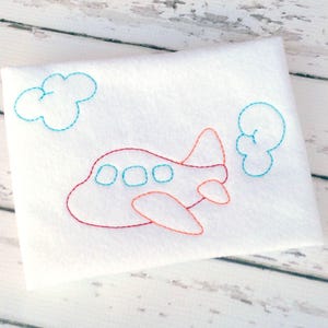 Disegno di ricamo a macchina con punto vintage e lavoro a colori di aeroplano