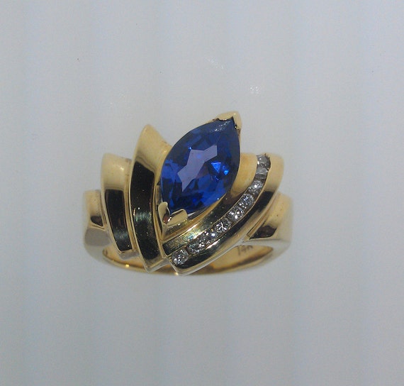 14K gold marquis tanzanite and diamond ring. Tanz… - image 3