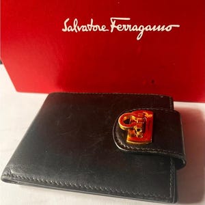 Salvatore Ferragamo Black Leather Wallet Card Holder Gancini Gold Latch Closure Unisex wallet Salvatore Ferragamo wallets Luxury