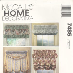 May include: A McCall's Home Decorating pattern featuring four window treatment designs. The designs include various styles of valances and curtains, showcasing different fabric patterns and shapes. The pattern number is 7485.