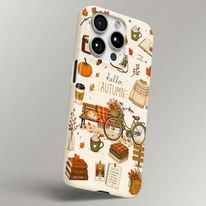 May include: A cream-colored smartphone case featuring a repeating pattern of autumn-themed illustrations including a pumpkin, a bicycle, a bench, a sweater, books, and mugs. The text "hello, AUTUMN" is printed in the center in a dark brown script font.