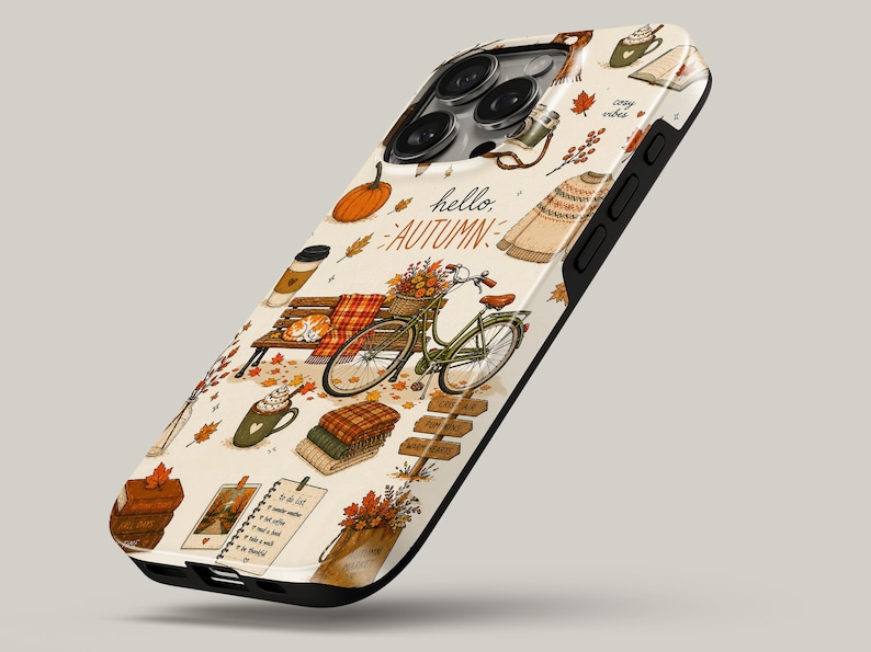 May include: A cream-colored phone case featuring an autumn-themed pattern with a green bicycle, a park bench, pumpkins, stacked sweaters, mugs of hot drinks, and falling leaves. The text "hello AUTUMN" is printed in the center of the design.