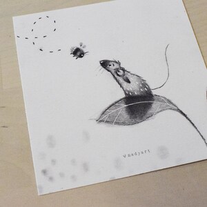 May include: A black and white drawing of a mouse sitting on a leaf, looking up at a bee flying in a circle above. The drawing is signed "Vnadyart" in the bottom right corner.