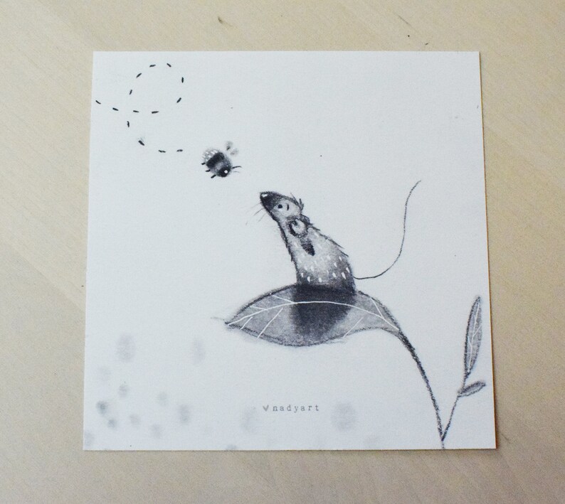 May include: A black and white drawing of a mouse sitting on a leaf, looking up at a bee flying in a circle above. The drawing is signed "Vnsdyart" in the bottom right corner.