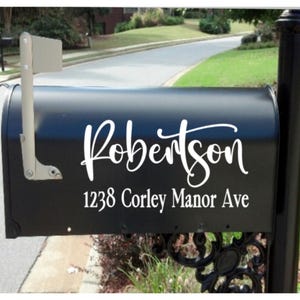 May include: Black mailbox with a white vinyl sticker that says "Robertson" and "1238 Corley Manor Ave."