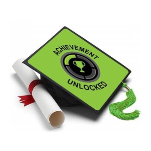 Adorno para birrete de graduación: logro desbloqueado. Adornos para birrete de graduación de Tassel Toppers.