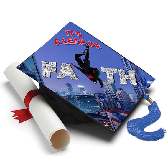 Its a Leap of Faith Spiderman Inspired Graduation Decor by Tassel Toppers. Grad Cap Topper