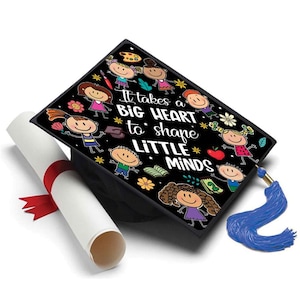 May include: A black graduation cap with a colorful design featuring children and the text "It takes a BIG HEART to shape LITTLE MINDS." A rolled diploma with a red ribbon and a blue tassel are also visible.