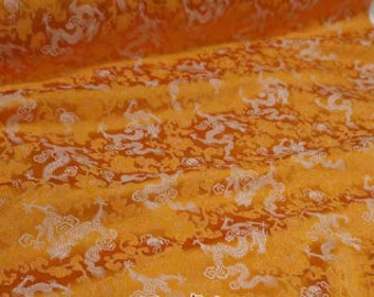 Tela brocada de color amarillo anaranjado con estampado de dragón, tela brocada jacquard, cortada a medida
