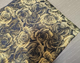 May include: Black fabric with a gold rose pattern. The fabric is textured and has a subtle sheen.