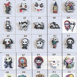 May include: A grid of 45 Halloween-themed shoe charms labeled Page 100-Halloween Charms. The collection features various icons including ghosts, skeletons, pumpkins, movie characters, bats, and skulls in diverse colors and shapes on a white background.