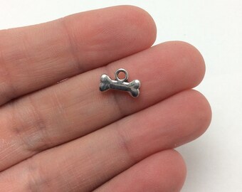 BULK 50 Bone charms antique silver tone A916
