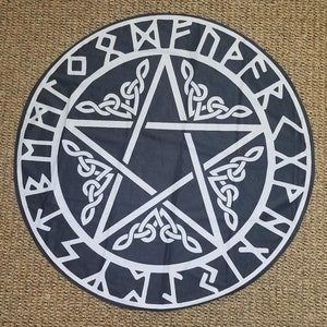 May include: A black and white pentagram with a circle of runes around the outside. The pentagram is made up of five points, each of which is connected to the next by a series of knots. The runes are in a circular pattern around the outside of the pentagram.