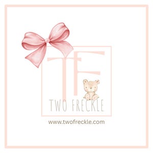a pink bow and a small bear, with the text "TWO FREECKLE" and "www.twofreckle.com" displayed prominently.