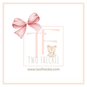 a pink bow and a small bear, with the text "TWO FREECKLE" and "www.twofreckle.com" displayed prominently.