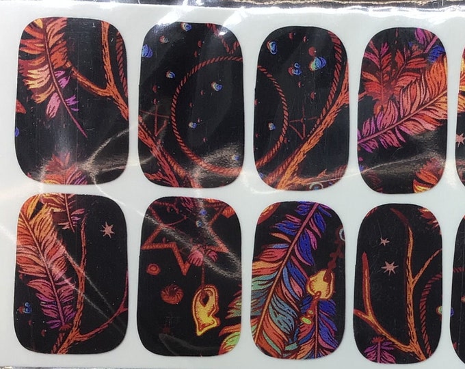 Crazy feathers that look like they are floating in space with these dark beautiful nail wraps