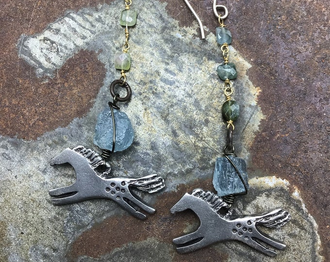 Galloping ponies with tourmaline and raw apatite stones in these fun whimsical dangling earrings by Weathered Soul Jewelry