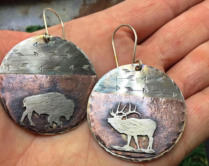 Into the great unknown earrings by Weathered Soul jewelry, elk and roaming buffalo make up these artisan beauties