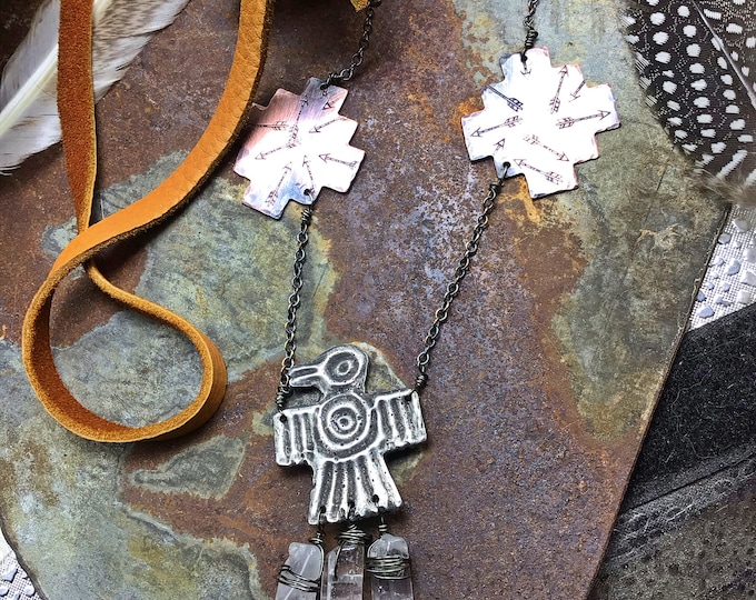 This thunderbird necklace lays just the way it should on the neckline, cowgirl chic,American west, western fashion