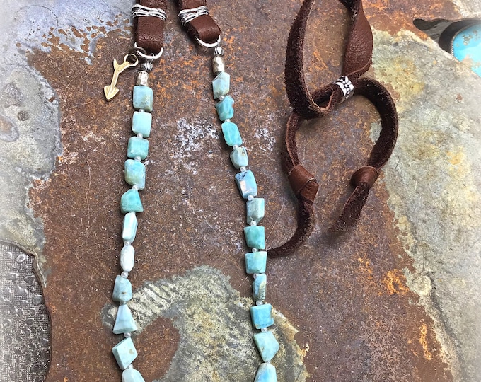 Beautiful Larimar stones drop from dark chocolate super soft leather with a quality classic look topped off with a little artisan arrow