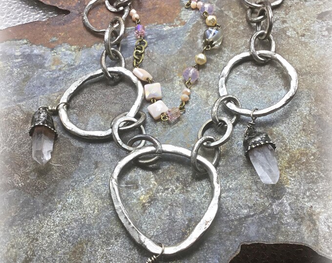 Upcycled vintage piece done Weathered Soul style, with Wild Horse bezel set drops of raw quartz and flirty rosary style chain, knock out