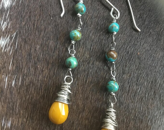 Fun long linked turquoise with mustard glass Swarovski glass wire wrapped teardrops with sterling ear wires. Approximately 2” long.