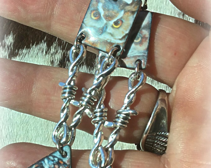 Double hoot owls watching you with a little barbed wire twist, rhinestone ear wires make these dazzle, one of a kind,totally handcrafted