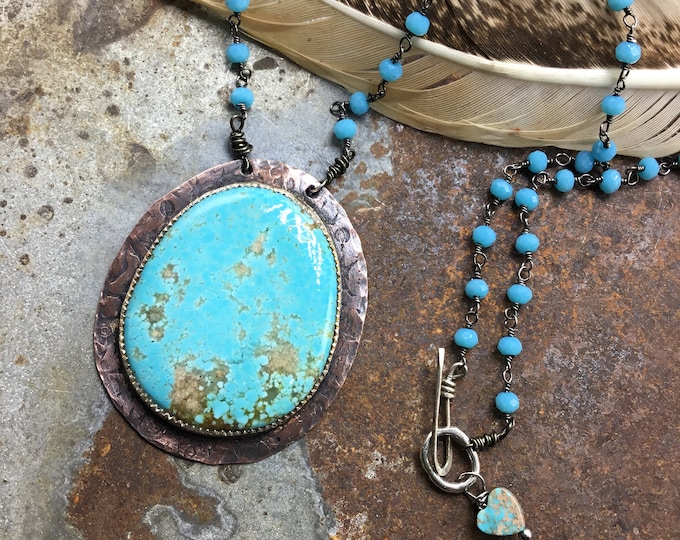 Stunning large robins egg blue Nevada American mined turquoise necklace with rosary style chain and leather closure over arrow button