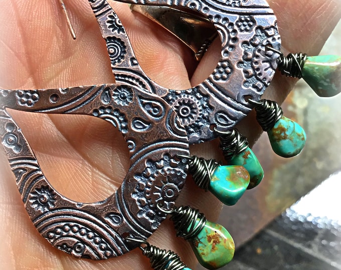 Bohowestern beauties embossed copper with turquoise teardrop stone’s dangling from bottom cowgirl or urban chic easy to go to these