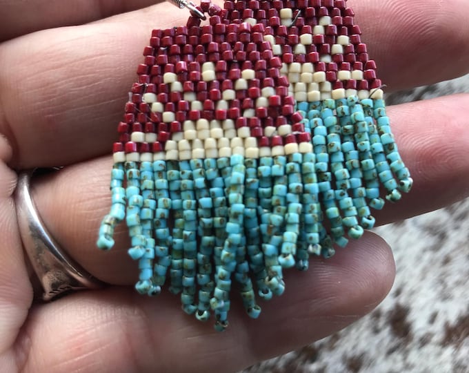Earthy fun little sunrise earrings with soft muted red and turquoise toned seed beads with sterling ear wires,urban cowgirl vibe! Love!