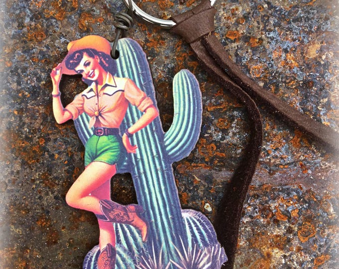 Little hottie retro cowgirl keychain by Weathered Soul made of wood and leather nice durable key loop approximately 4” long