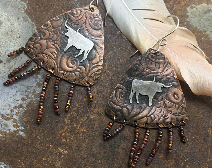 Let’s get western longhorn earrings on cool rustic oxidized tooled leather looking copper sterling wires and beaded fringe,western style