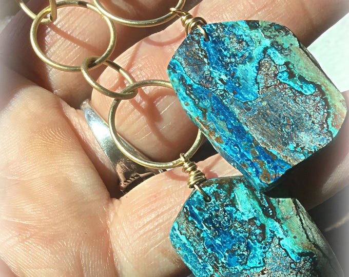 Stunning large slabs of Chrysocolla stones drop from different sized bronze soldered hoops, shoulder dusters by Weathered Soul jewelry
