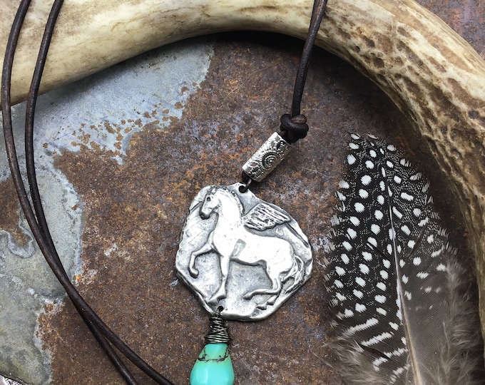 Prancing Pegasus Pony trots along this large pendant with a touch of turquoise and dark chocolate Greek cord leather,horse lover