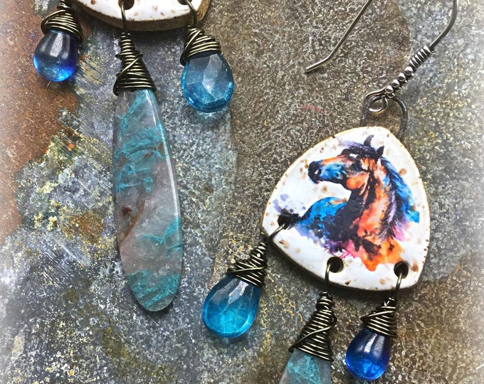 All the pretty ponies earrings by Weathered Soul jewelry,pottery and gemstones dangle in beautiful blue tones, wire wrapped ,horse lover